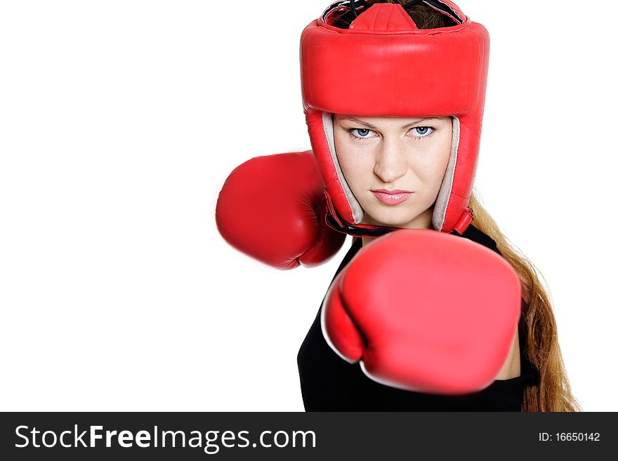 Young female boxer over white