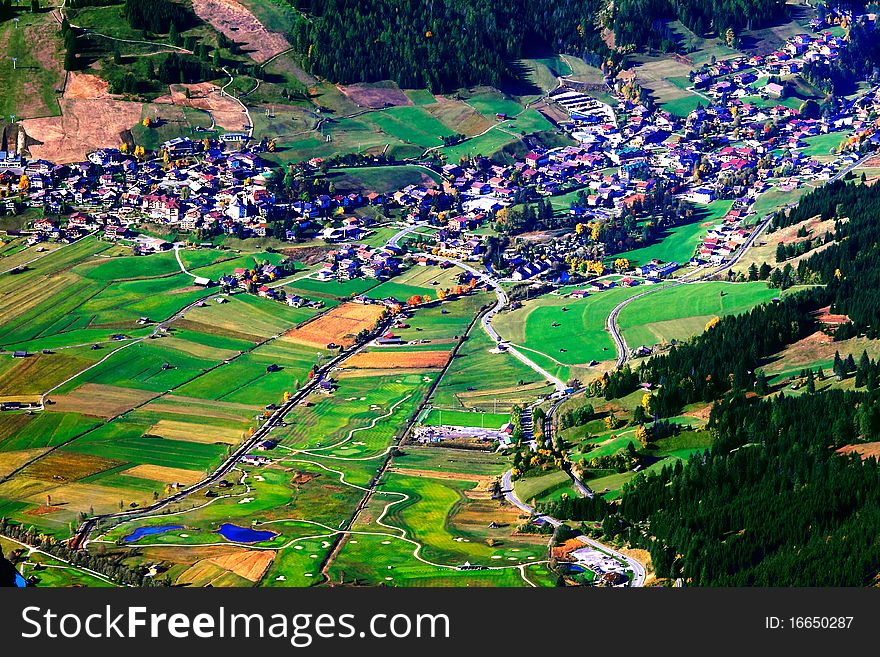 Village and fields at the foot of Peak of Zugspitze