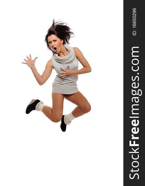 Dynamic beautiful wild winter woman jumping and screaming. isolated on white background