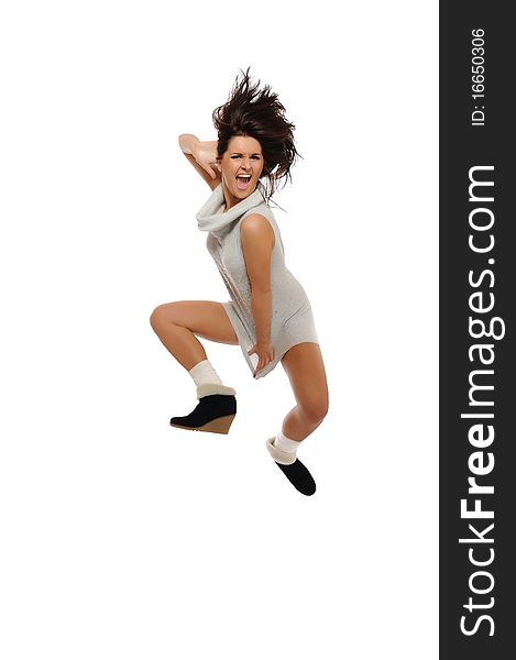 Dynamic beautiful wild winter woman jumping and screaming. isolated on white background