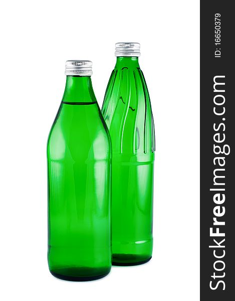 Water in bottles isolated white. Clipping path. Water in bottles isolated white. Clipping path.