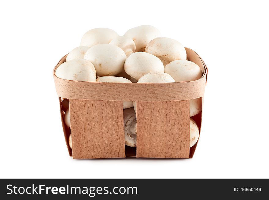 Mushrooms in box isolated on white background. Mushrooms in box isolated on white background.