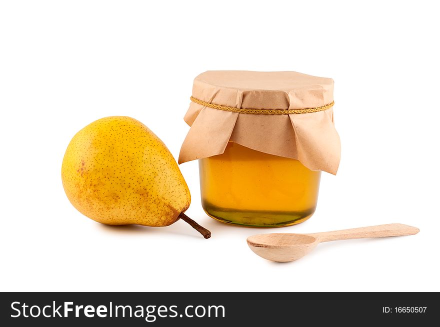 Honey, pear, wooden spoon isolated on white background. Honey, pear, wooden spoon isolated on white background.