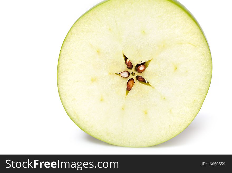 Fresh green apple cut into slices. isolated on white background