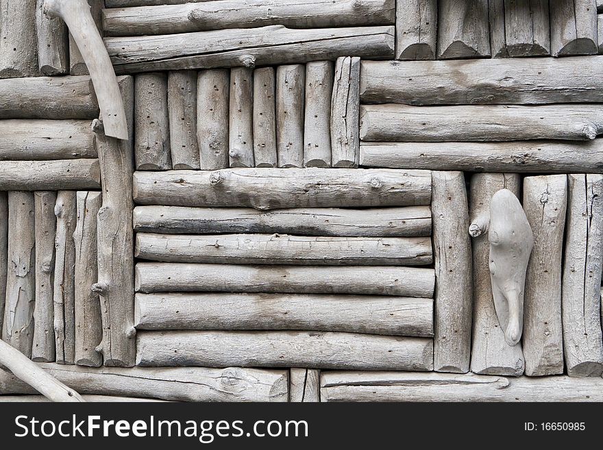 This is a closeup photo of a gray log exterior wall that is suitable for a background. This is a closeup photo of a gray log exterior wall that is suitable for a background.