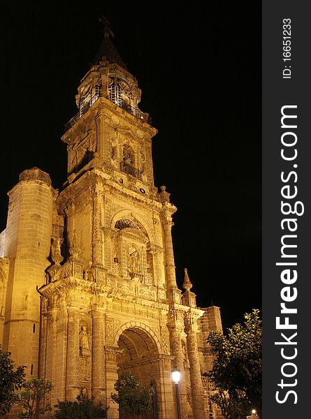 The night view of St. Miguel church, built in gothic-baroque style, in Jerez de la Frontera, Spain. The night view of St. Miguel church, built in gothic-baroque style, in Jerez de la Frontera, Spain.