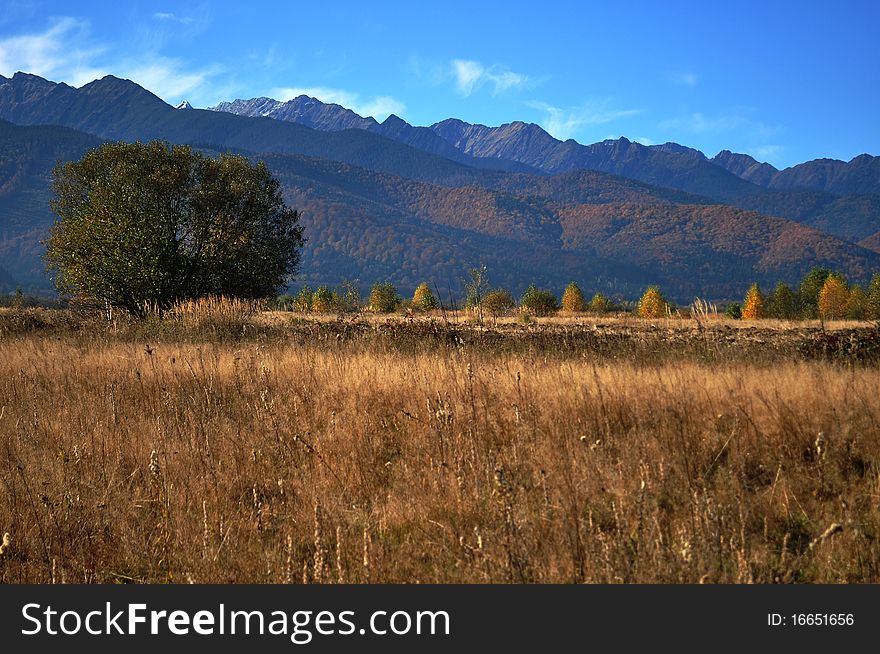 Mountains landscape in a warm autumn. Mountains landscape in a warm autumn