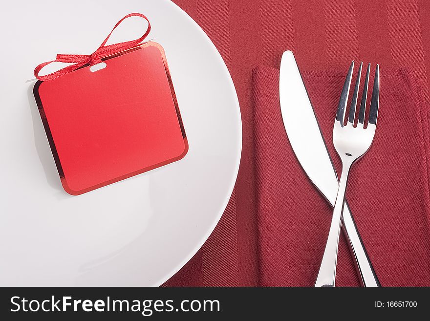 Little holiday cards on the table with the objects table set.