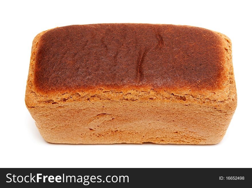 Loaf of fresh appetizing bread on white background