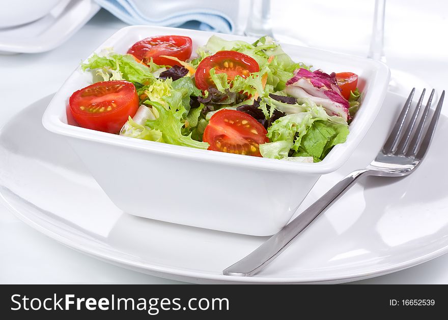 Fresh salad with vegetables and greens