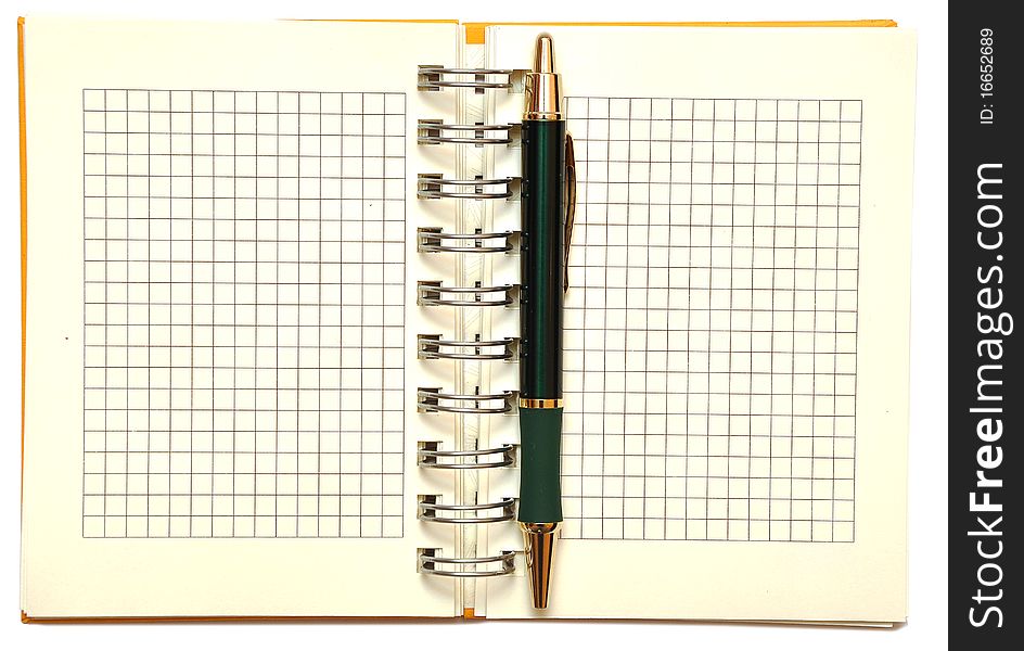 Open spiral bound notebook with pen