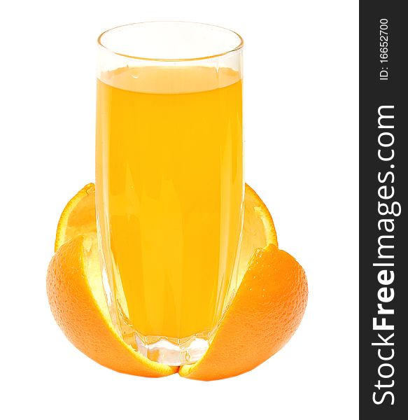 Orange juice in a glass on rind isolated on white background