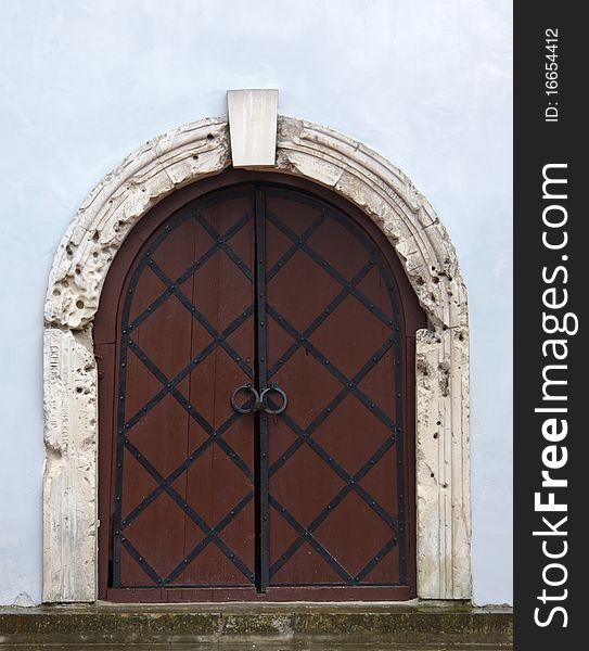 Ancient door in a medieval monastery in Ukraine