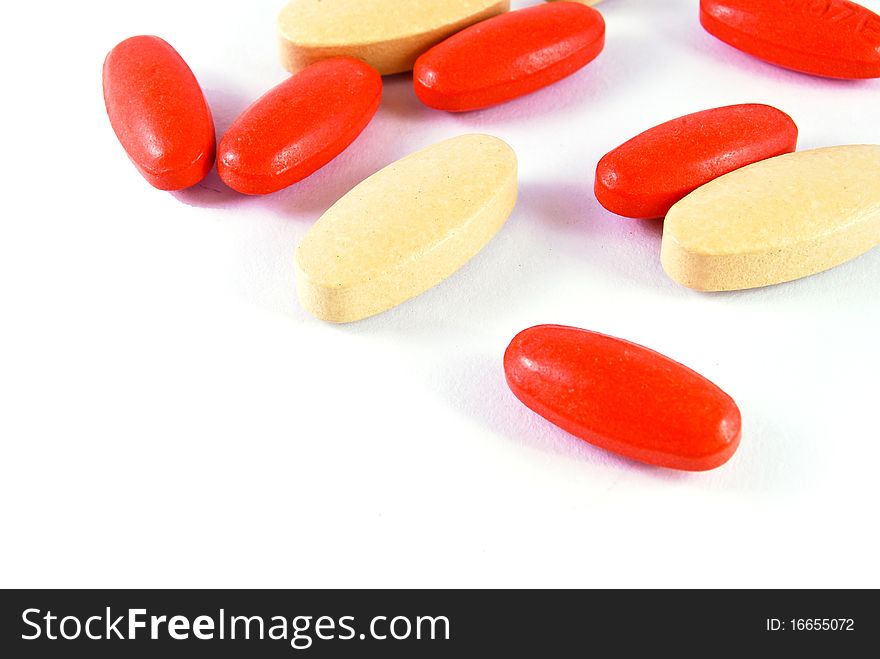 Vitamin medicine tablets isolated on white background. Vitamin medicine tablets isolated on white background