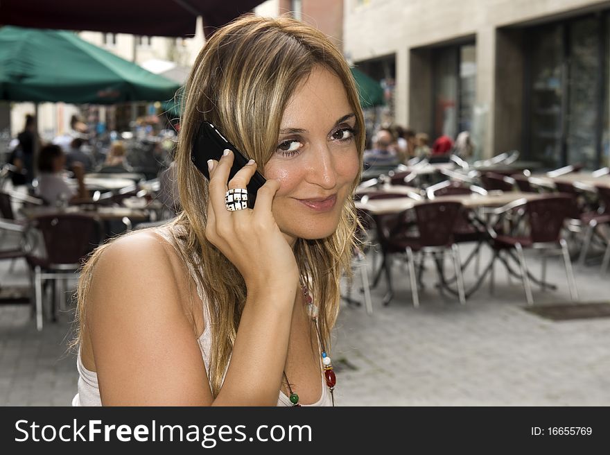 Young Woman At Outdoor Cafe