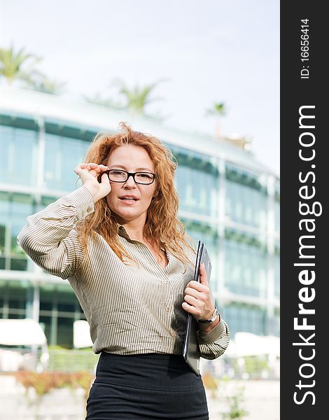 Real office worker posing for camera outdoor