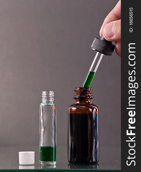 Hand Creating a Liquid Medicine