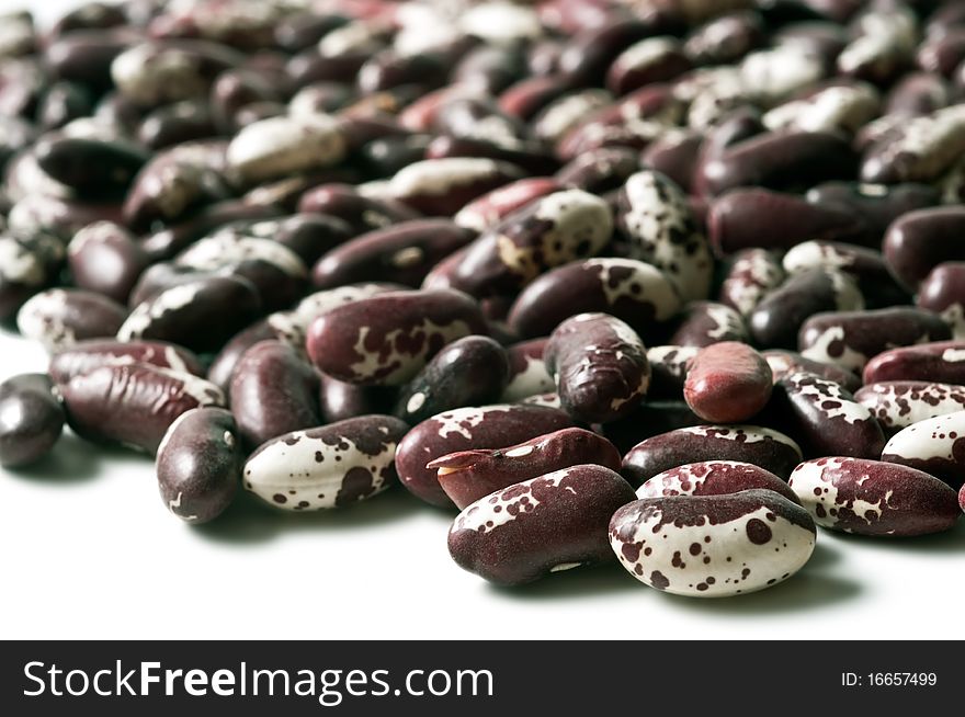 Beans close-up isolated in a white background