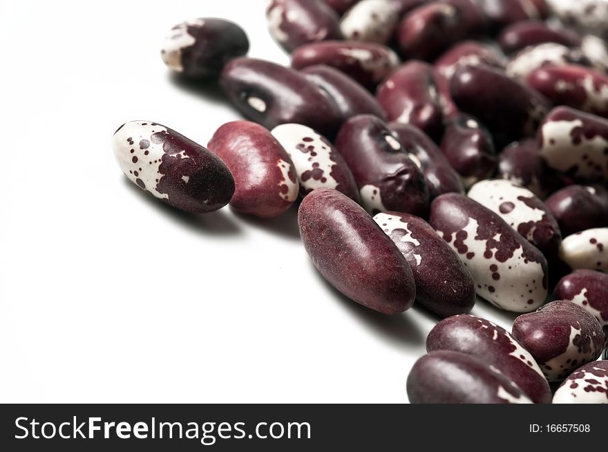 Beans close-up isolated in a white background