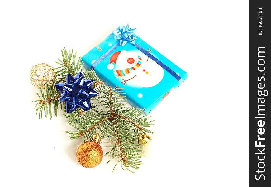 Christmas gift with a decoration on white background