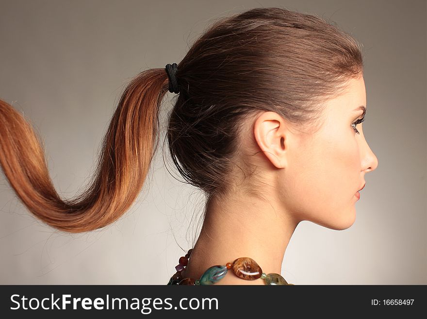 Portrait of beautiful brunette in the studio