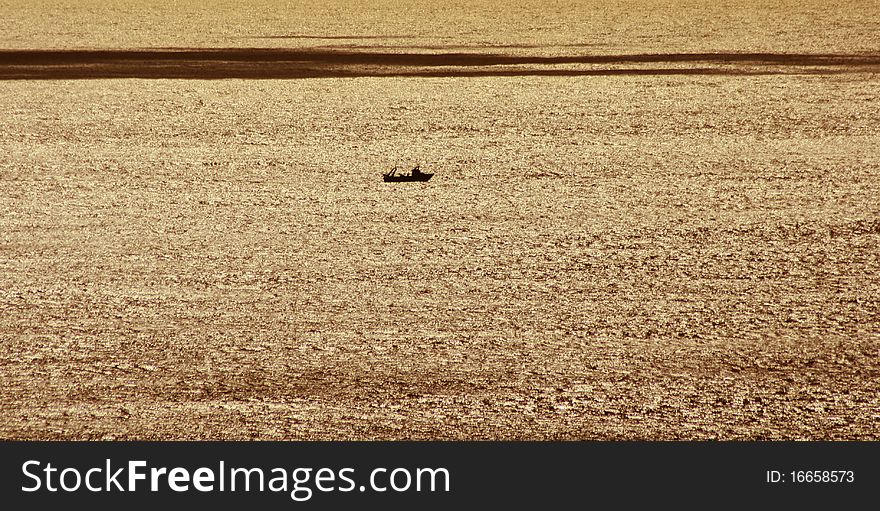 Fishing boat in the distance