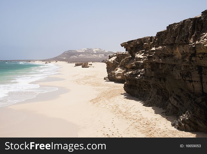 Beautiful and quite beach with rock all around. Beautiful and quite beach with rock all around