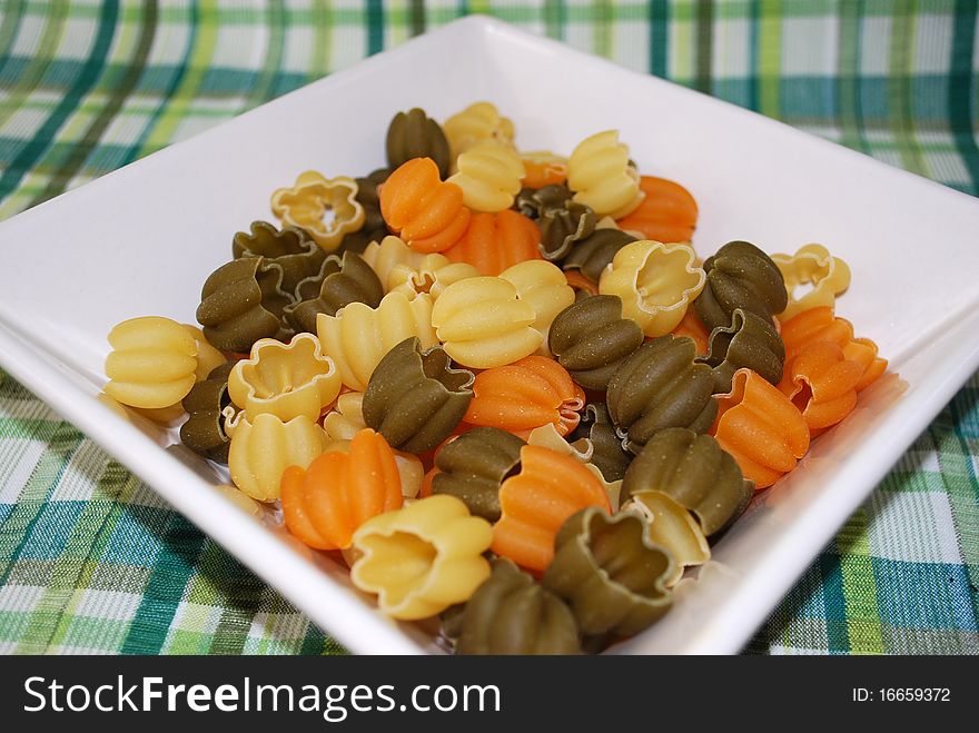 Italian pasta with vegetables. Dry pasta ready to cook.