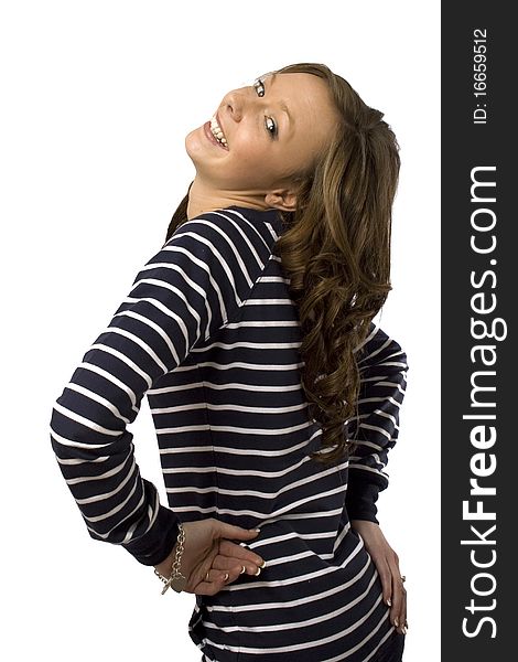 Young girl posing in a striped top and white background. Young girl posing in a striped top and white background.