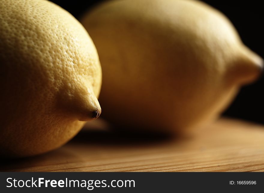 Fresh lemon lying on a wooden support