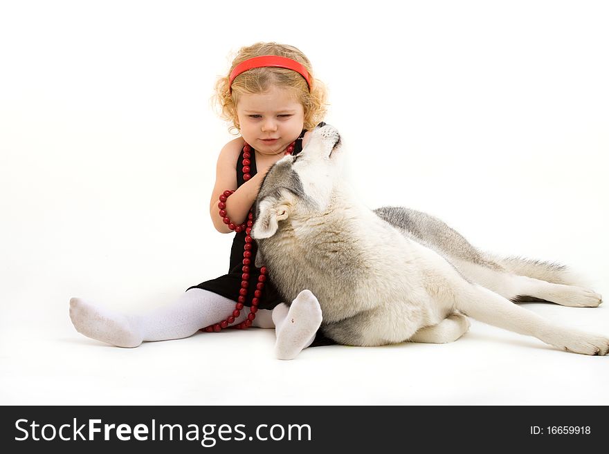 Cute little girl with dog isolated on white