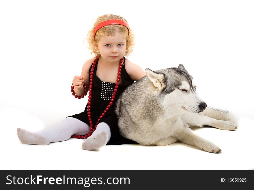 Child playing with dog isolated