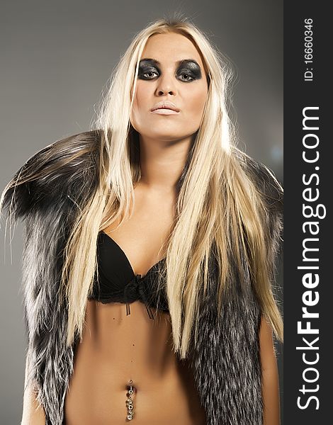 Beautiful model dressed in fur. Beautiful model dressed in fur