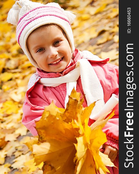 Autumn portrait of cute little caucasian girl