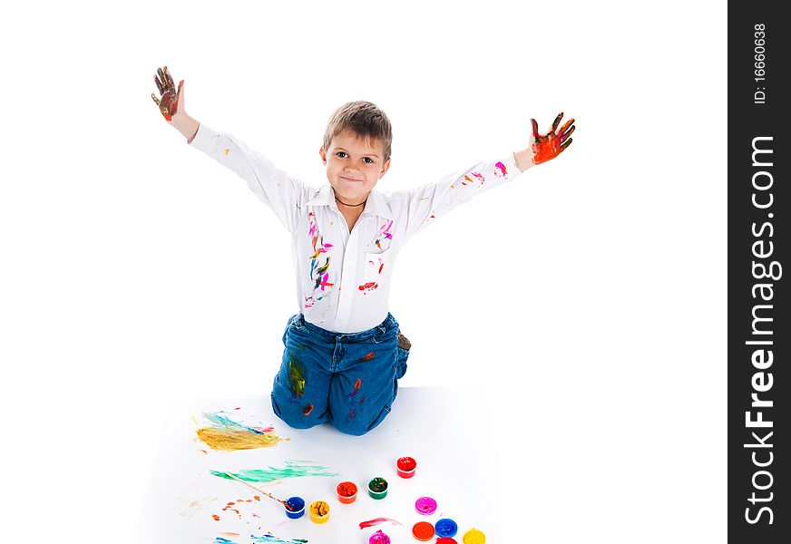 Adorable 3 year old boy covered in bright paint. Adorable 3 year old boy covered in bright paint.