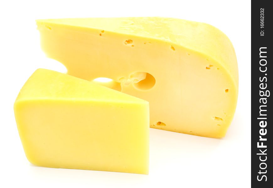 A piece of Swiss cheese isolated on white yellow delicatessen;