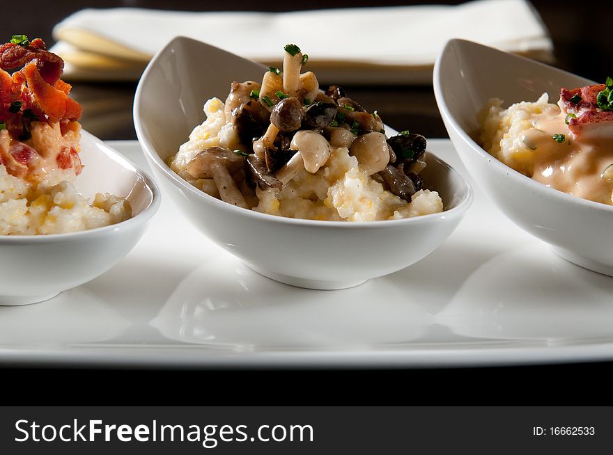 Grits with bacon, mushroom, and lobster. Grits with bacon, mushroom, and lobster