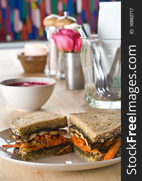 Carrot and tofu sandwich with basil spread on wheat bread