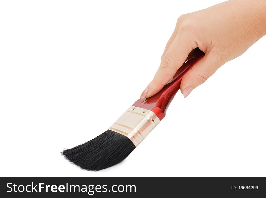 Hand with brush isolated on white background. Hand with brush isolated on white background