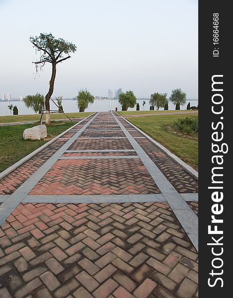 Red stone path at the park of modern china