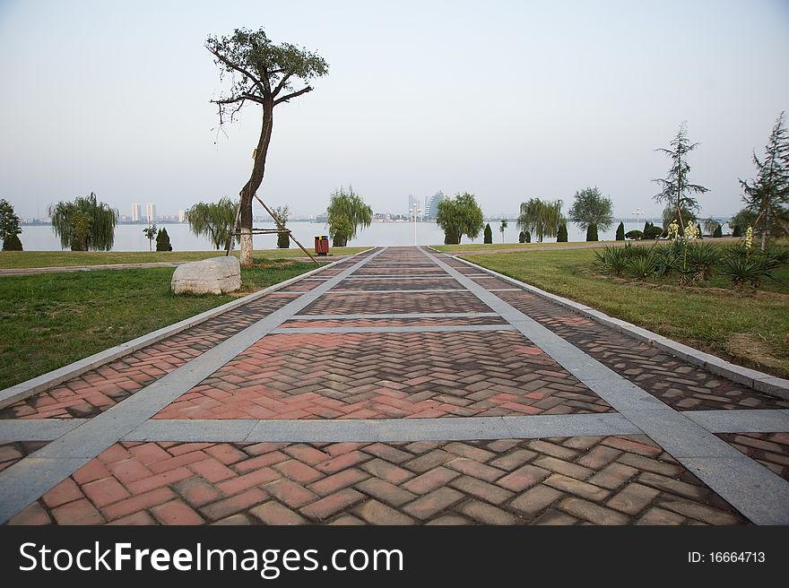 Red stone path at the park of nice city france. Red stone path at the park of nice city france