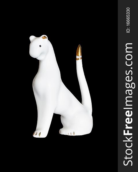 White panther figurine isolated on black background. White panther figurine isolated on black background