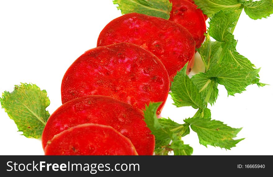 Cactaceous fig cuting with mint brunch isolated on white background. Cactaceous fig cuting with mint brunch isolated on white background