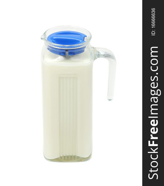 Milk in a glass jar isolated on a white background. Milk in a glass jar isolated on a white background