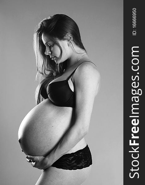 Pregnant woman in the studio