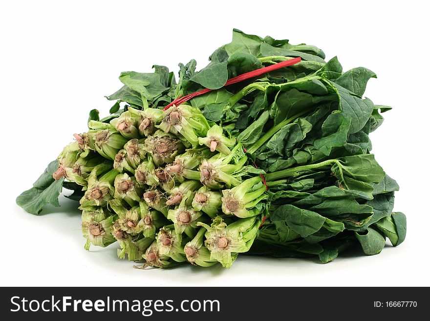 Spinach isolated on white with natural shadows