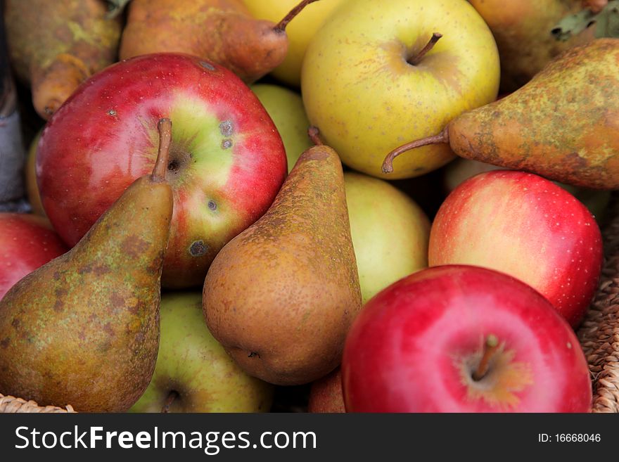 Pears and apples in the basket. Pears and apples in the basket