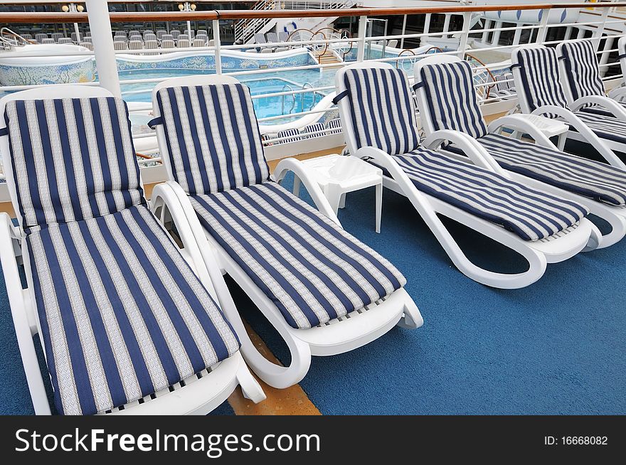 Beach Chairs By The Pool