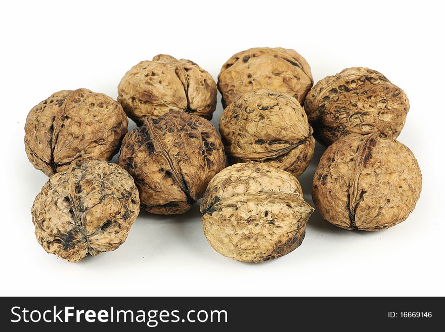 Some Walnuts on white background