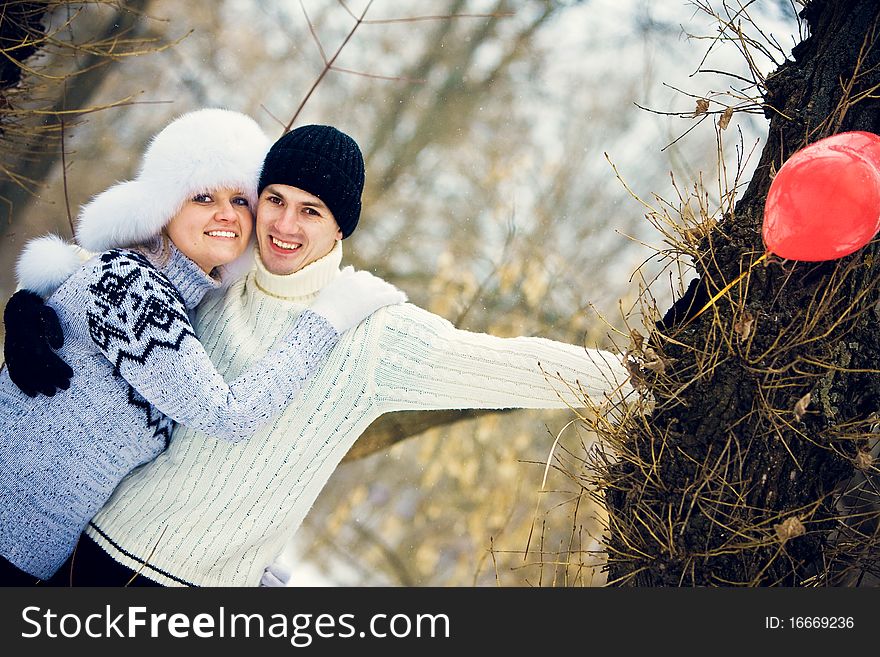 Young couple in love smiling and hugging